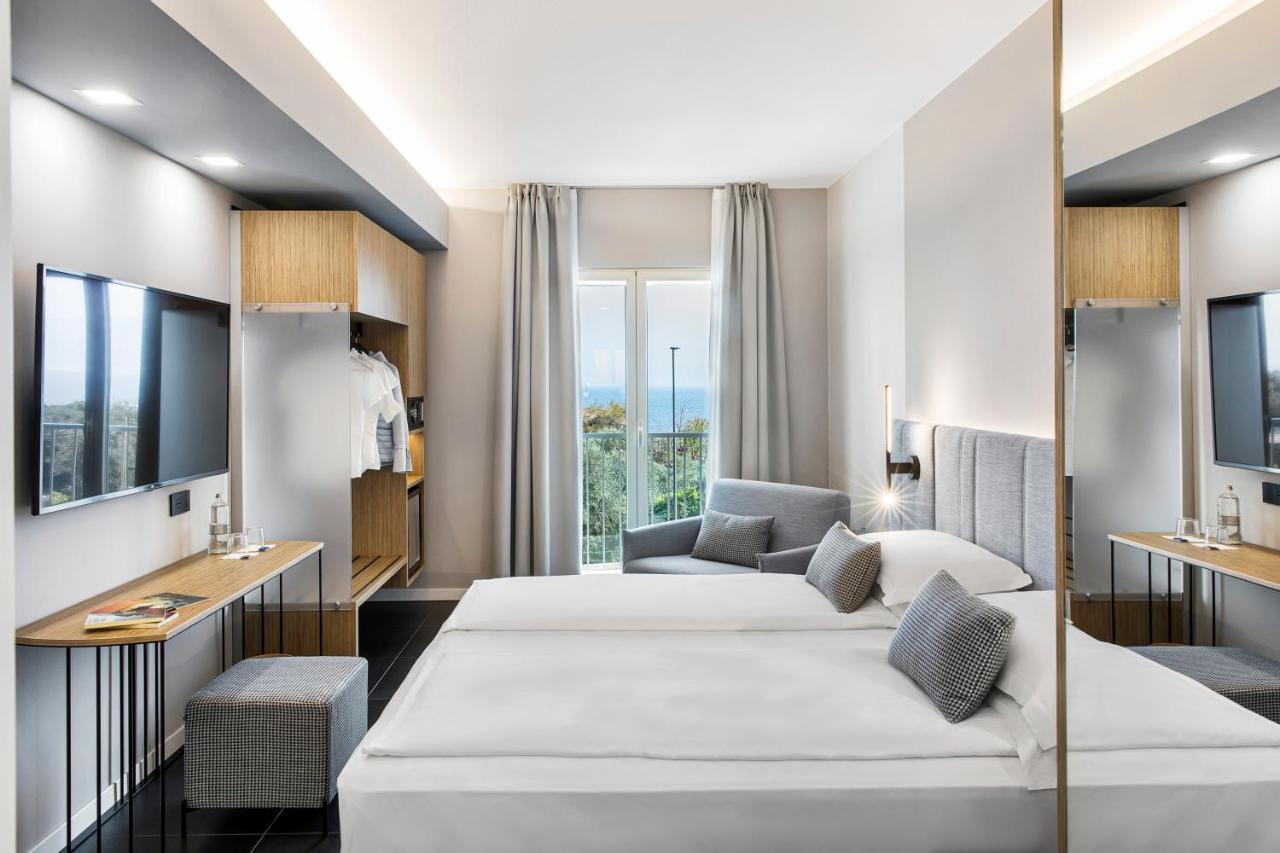 Reflection Boutique Hotels Тосколано-Мадерно Экстерьер фото