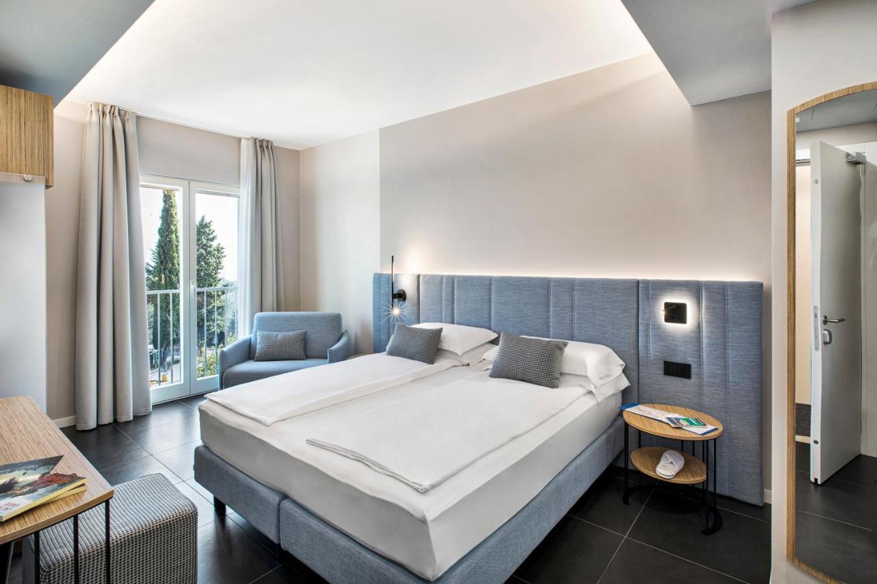 Reflection Boutique Hotels Тосколано-Мадерно Экстерьер фото